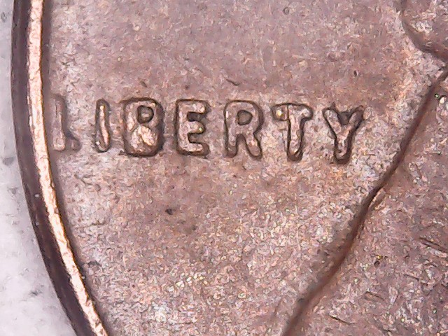 1957-D-LWC-Die-Chips-On-B-In-Liberty-And-5-In-The-Date?